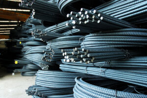 Steel rods or bars used to reinforce concrete, in warehouse